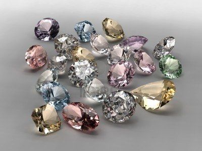 269657-shiny-diamonds-in-different-shapes-and-colors-on-gray-background.jpg